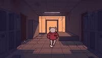 a person walking down a hallway in a building