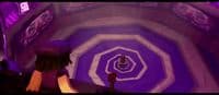 a person standing in front of a purple and white tunnel