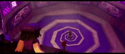 a person standing in front of a purple and white tunnel