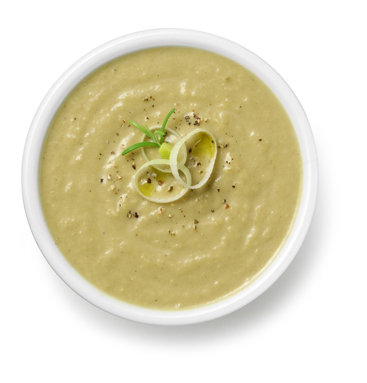 a bowl of soup with a spoon in it