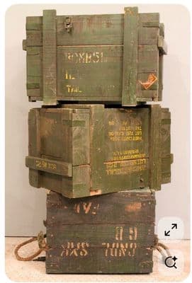 a stack of wooden crates sitting on top of each other