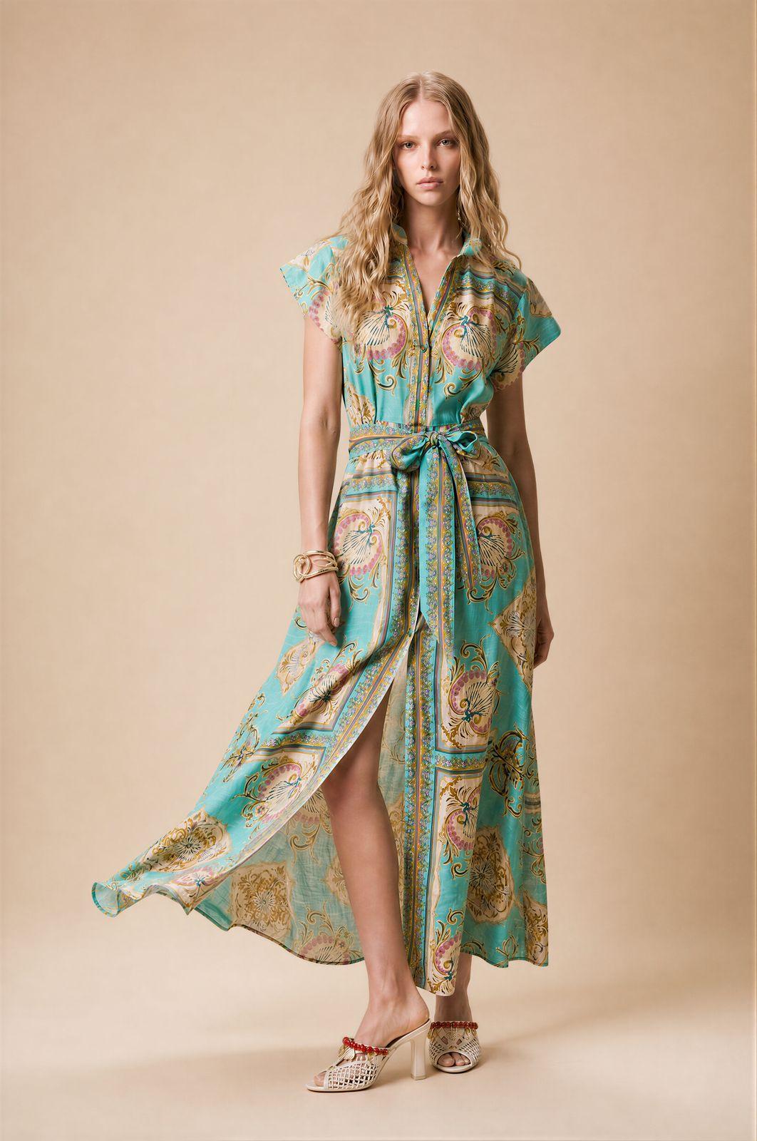 a woman in a dress with a high slit