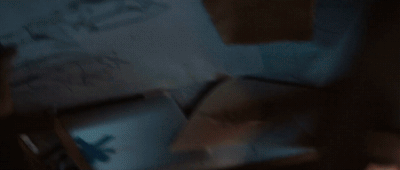 a blurry photo of a person using a tablet