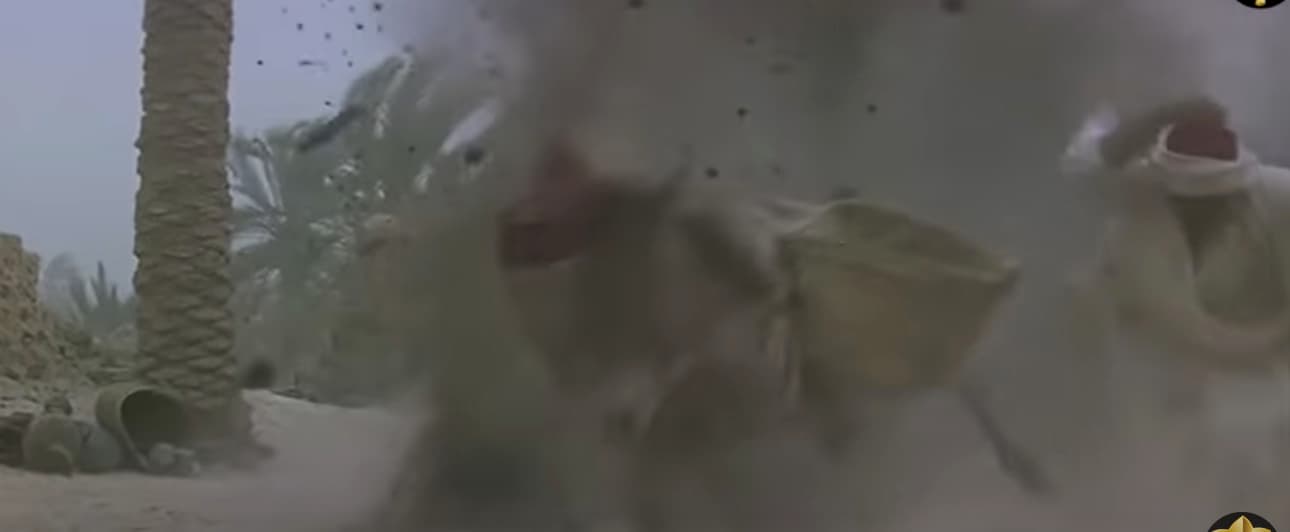 a blurry image of a man in a white robe