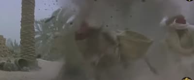 a blurry image of a man in a white robe