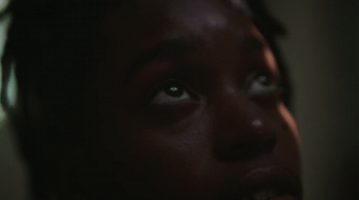 a close up of a person with a tooth brush in their mouth