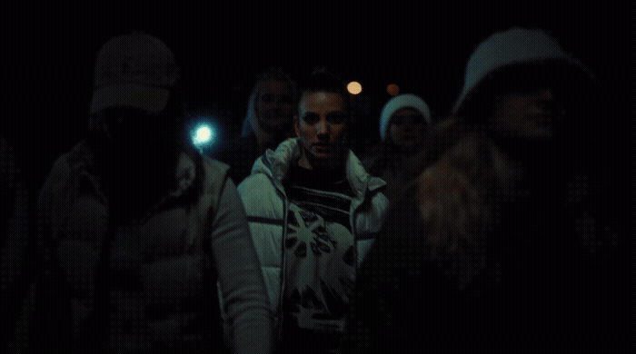 a group of people standing next to each other