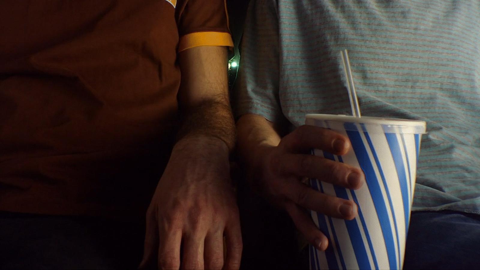 a couple of people sitting next to each other