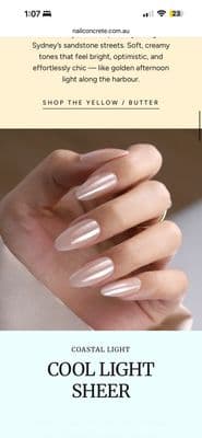 a woman's hand with long, shiny nails