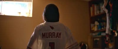 the back of a woman's shirt that reads murray