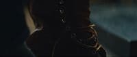 a close up of a person's boots with a dark background