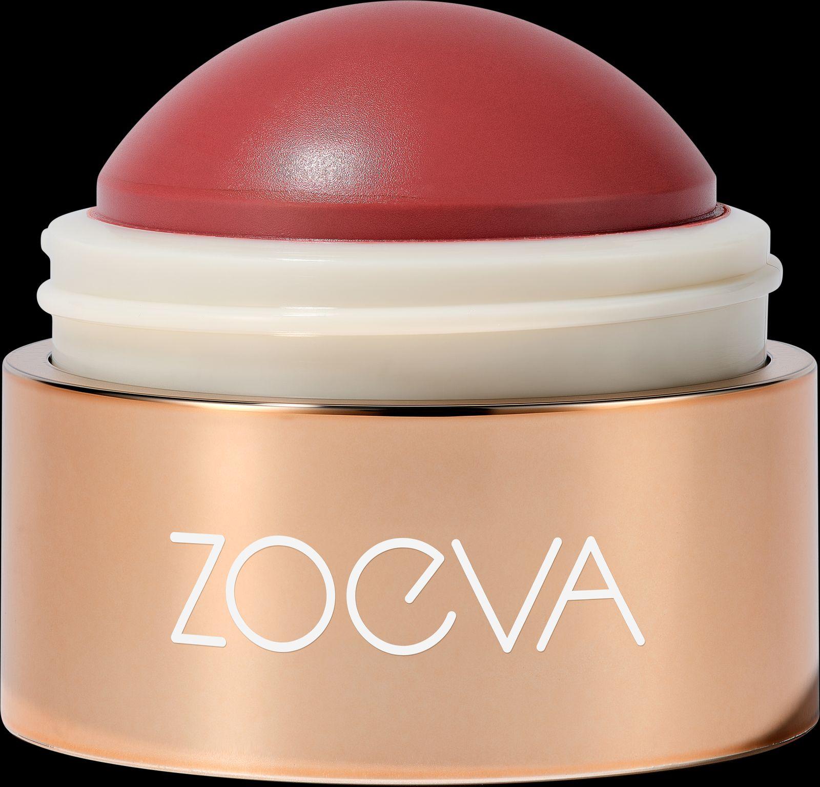 a close up of a red and white container