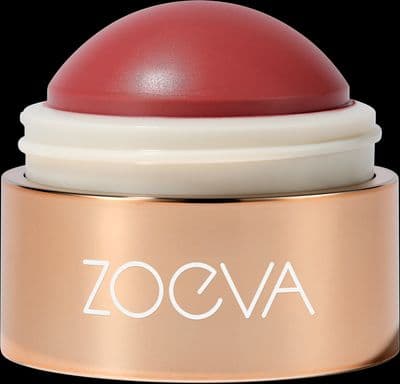 a close up of a red and white container