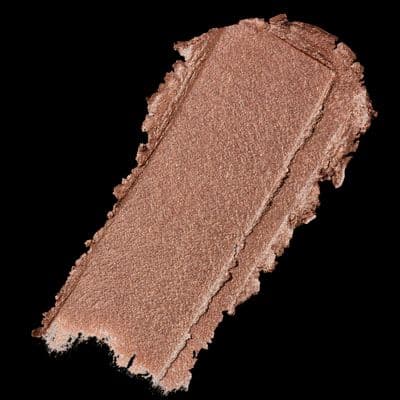 a close up of a liquid eye shadow on a black background