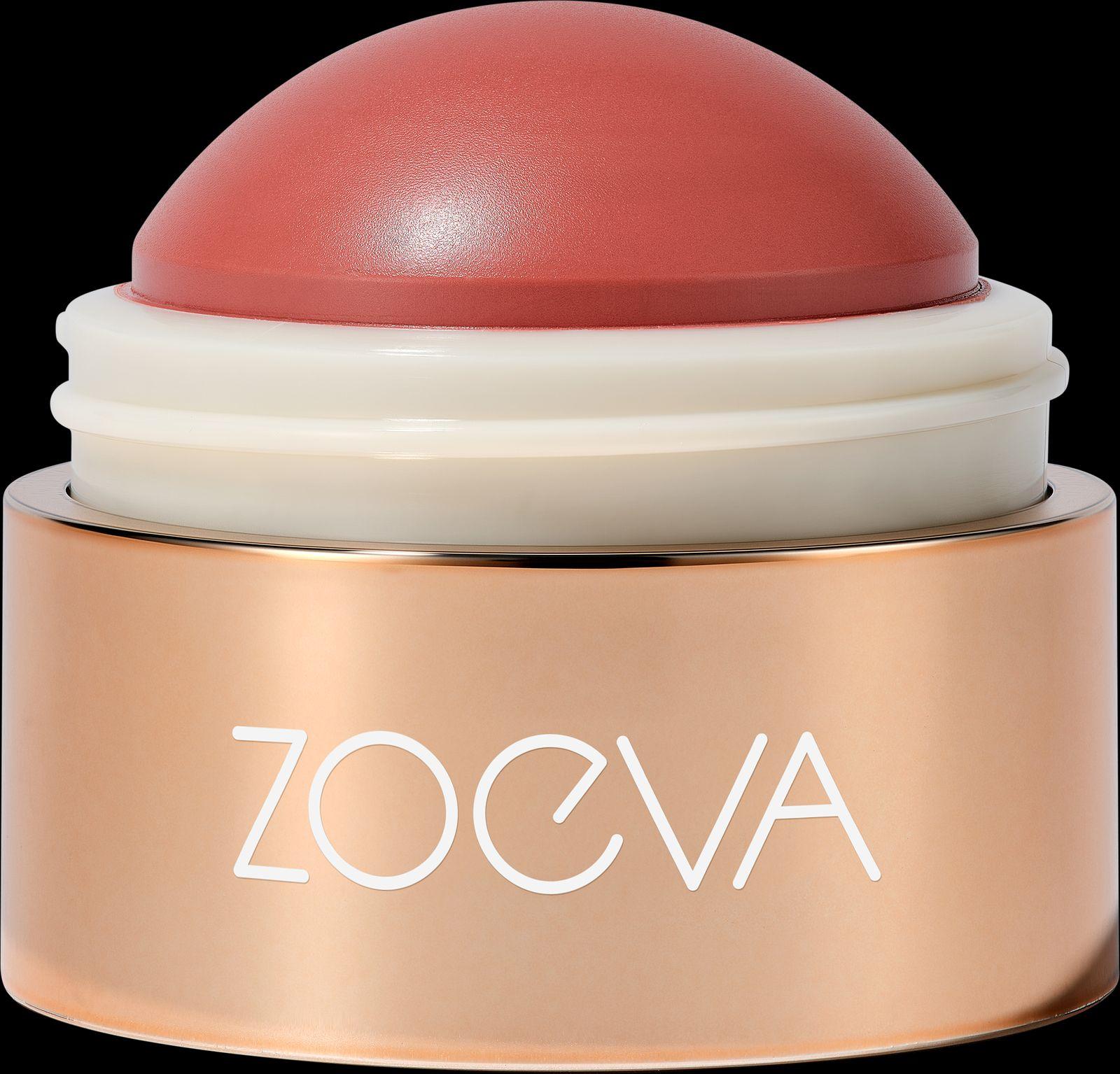 a close up of a red and white container