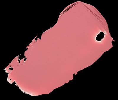 a close up of a pink lipstick with a hole in the middle