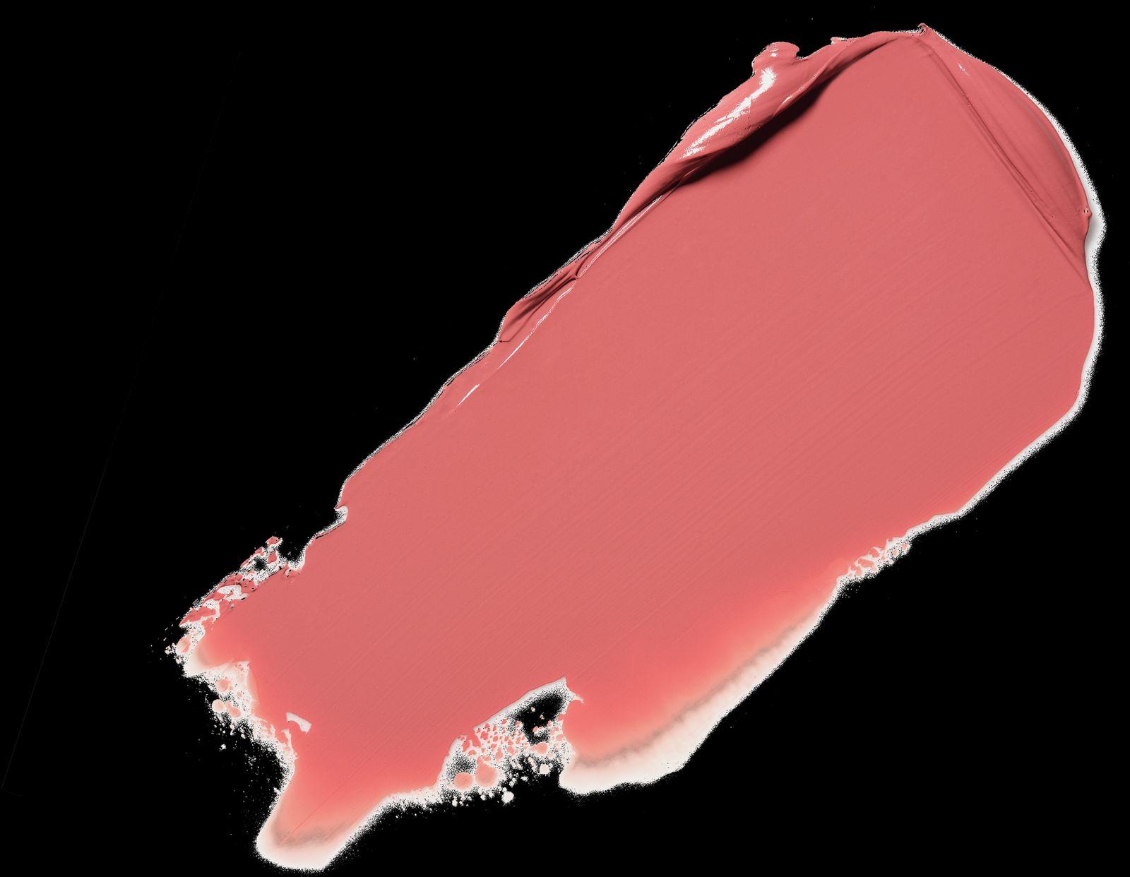 a close up of a pink lipstick on a black background