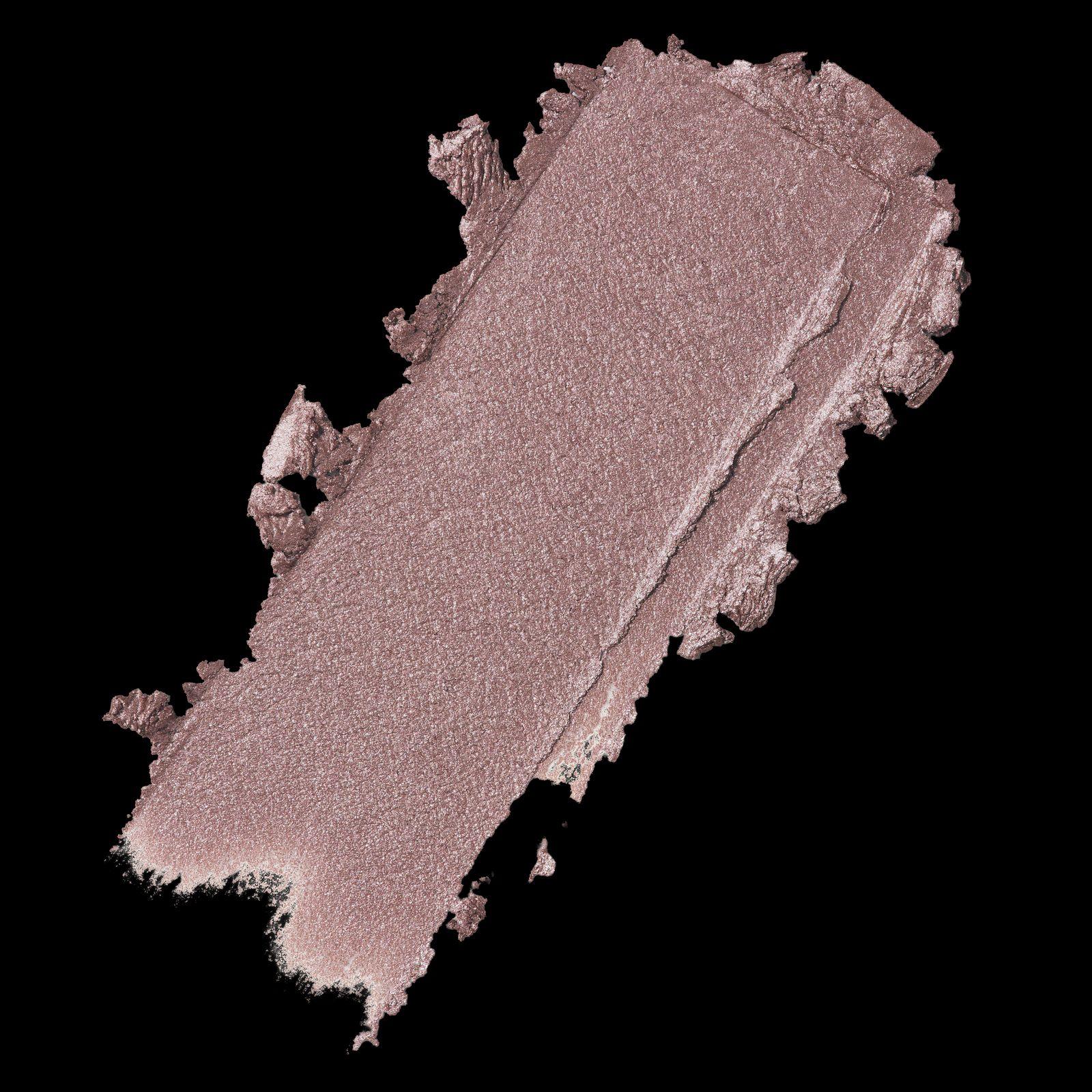 a close up of a powdered eye shadow on a black background