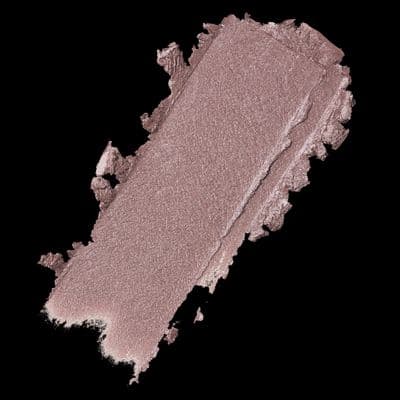 a close up of a powdered eye shadow on a black background
