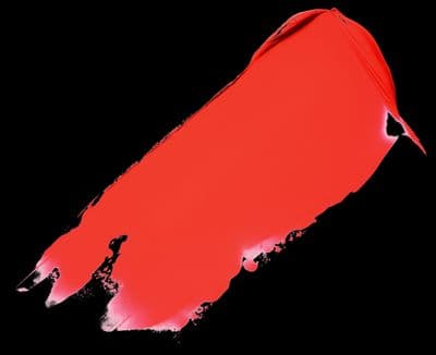 a red paint smudge on a black background