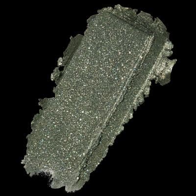 a close up of a piece of silver glitter