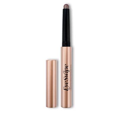 a close up of a lipstick with a pen