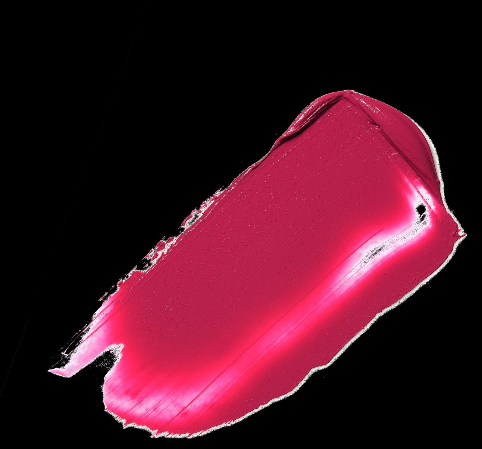 a close up of a pink tube of liquid
