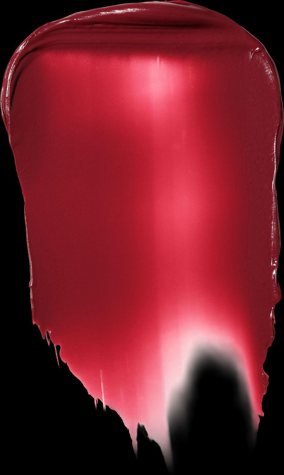 a close up of a red liquid with a black background