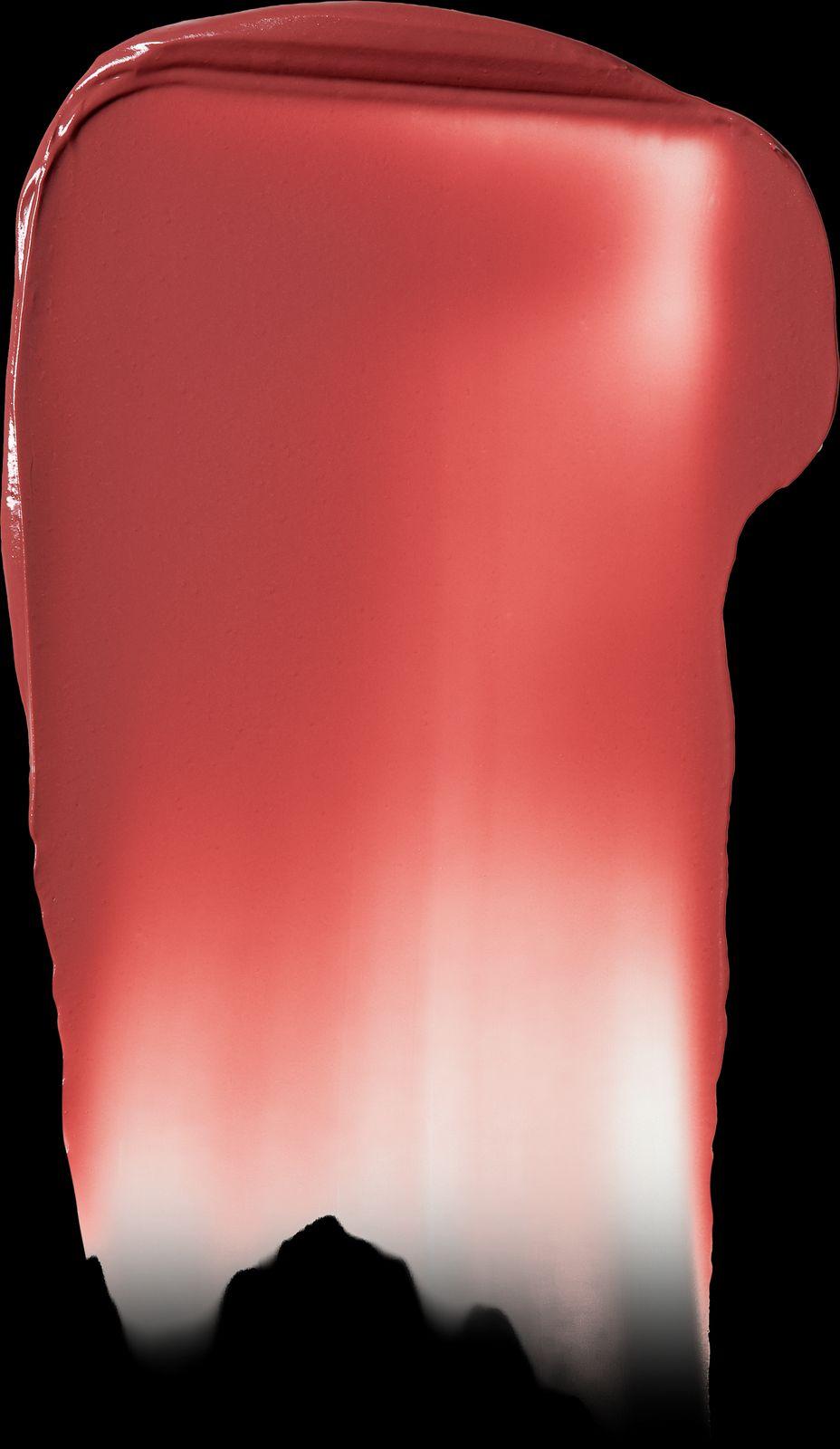 a close up of a red and white object on a black background