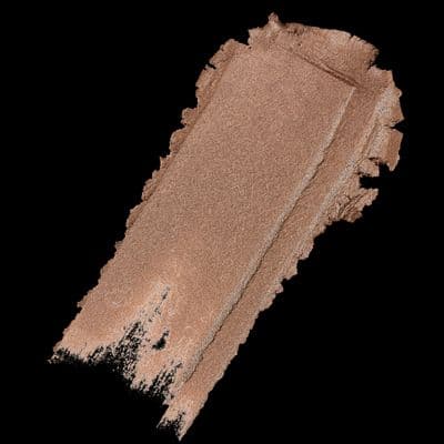 a close up of a brown liquid with a black background