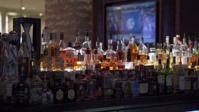 a bar with a lot of liquor bottles on it