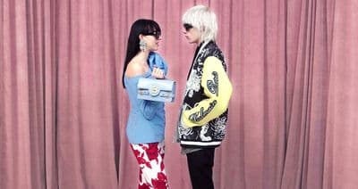 a couple of women standing next to each other
