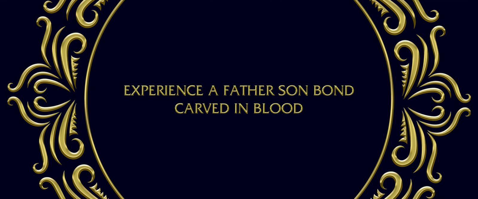 a gold frame with the words experience a father bond carved in blood