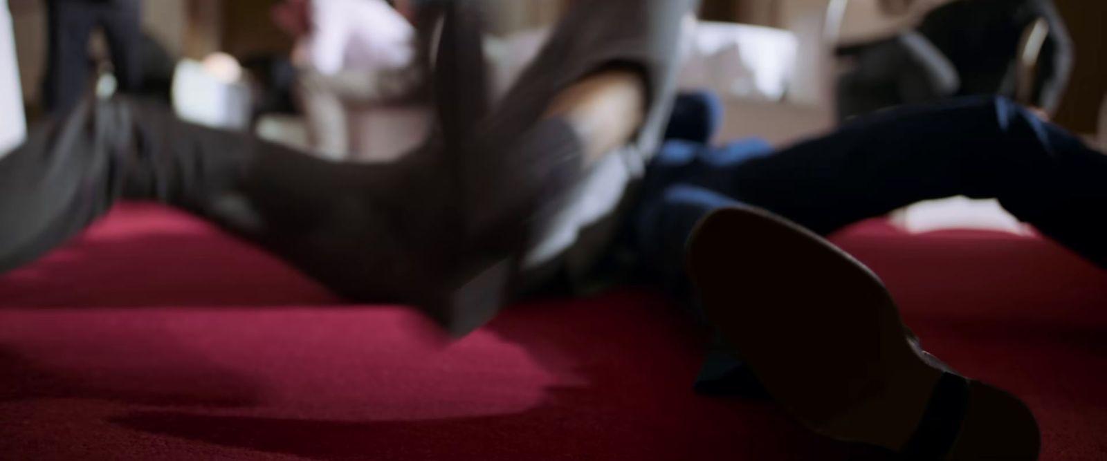 a blurry photo of a person laying on the floor