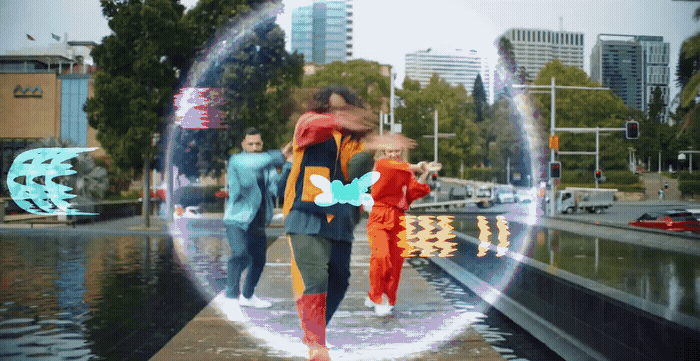 a couple of people that are walking in the water