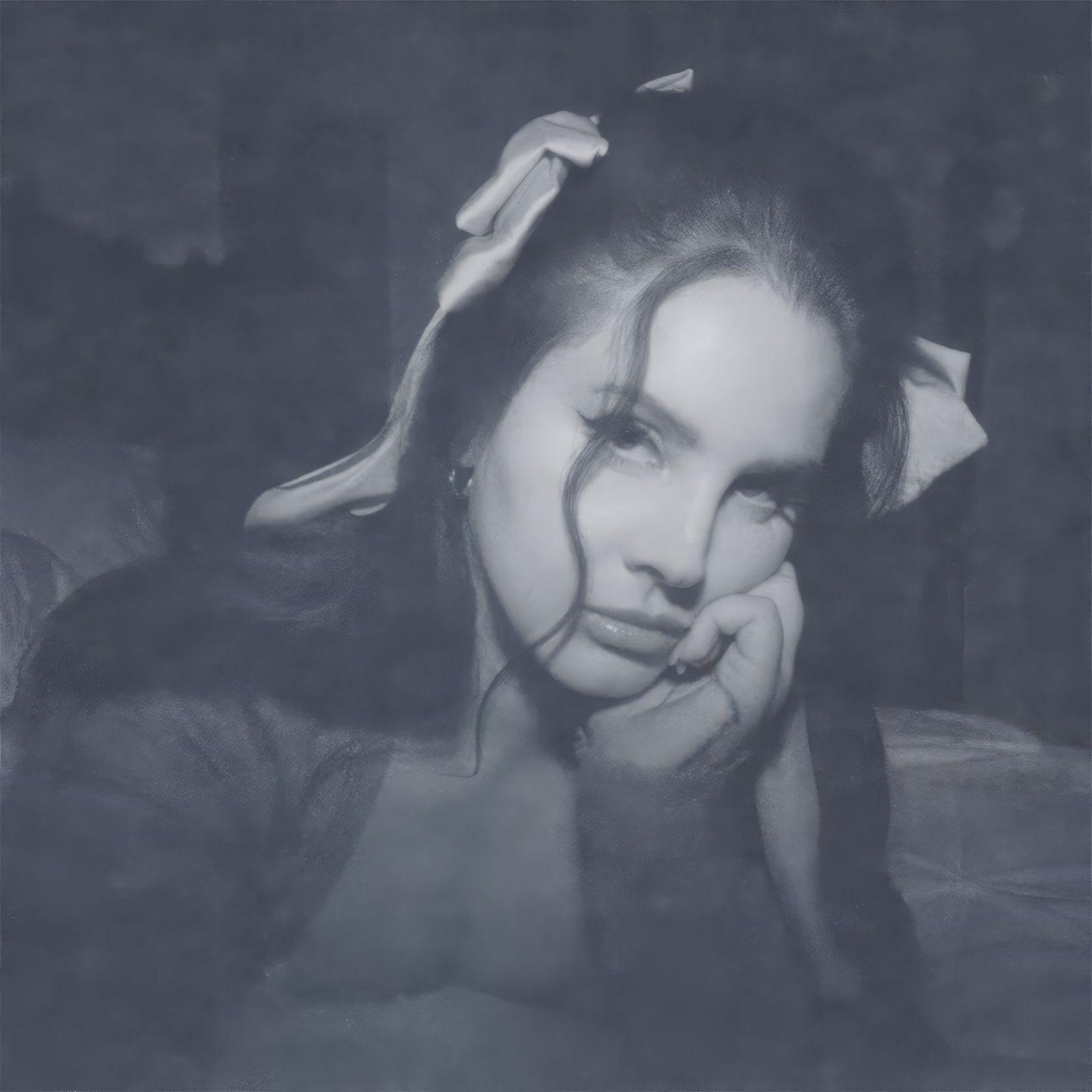 a black and white photo of a woman with her hands on her face