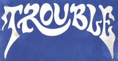 a blue background with white lettering that says trouble