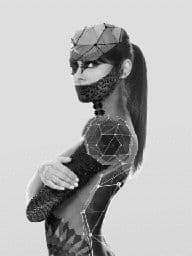 a black and white photo of a woman in a body suit