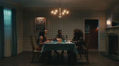 a group of people sitting around a table