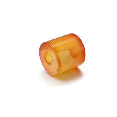 a yellow and orange object on a white surface