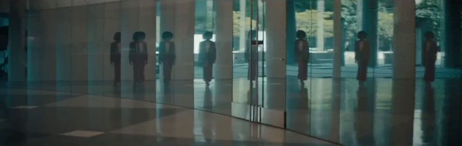 a group of people standing in front of a building