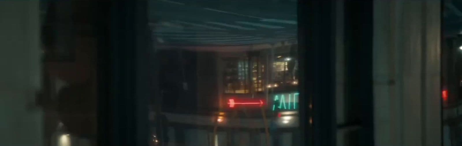 a blurry photo of a city street at night