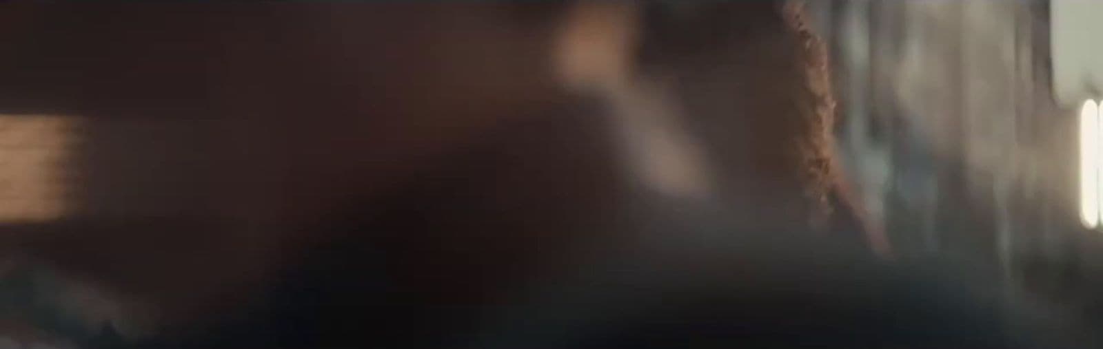 a blurry photo of a person taking a picture
