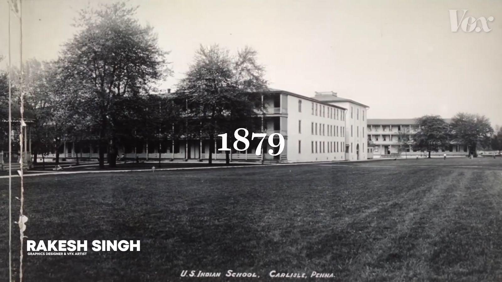 a black and white photo of a large building