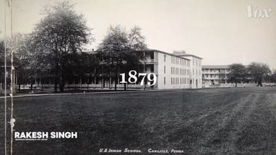 a black and white photo of a large building