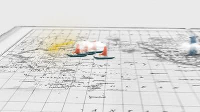 a close up of a map with candles on it
