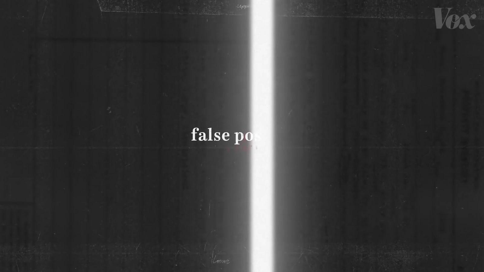 a black and white photo of a tall pole