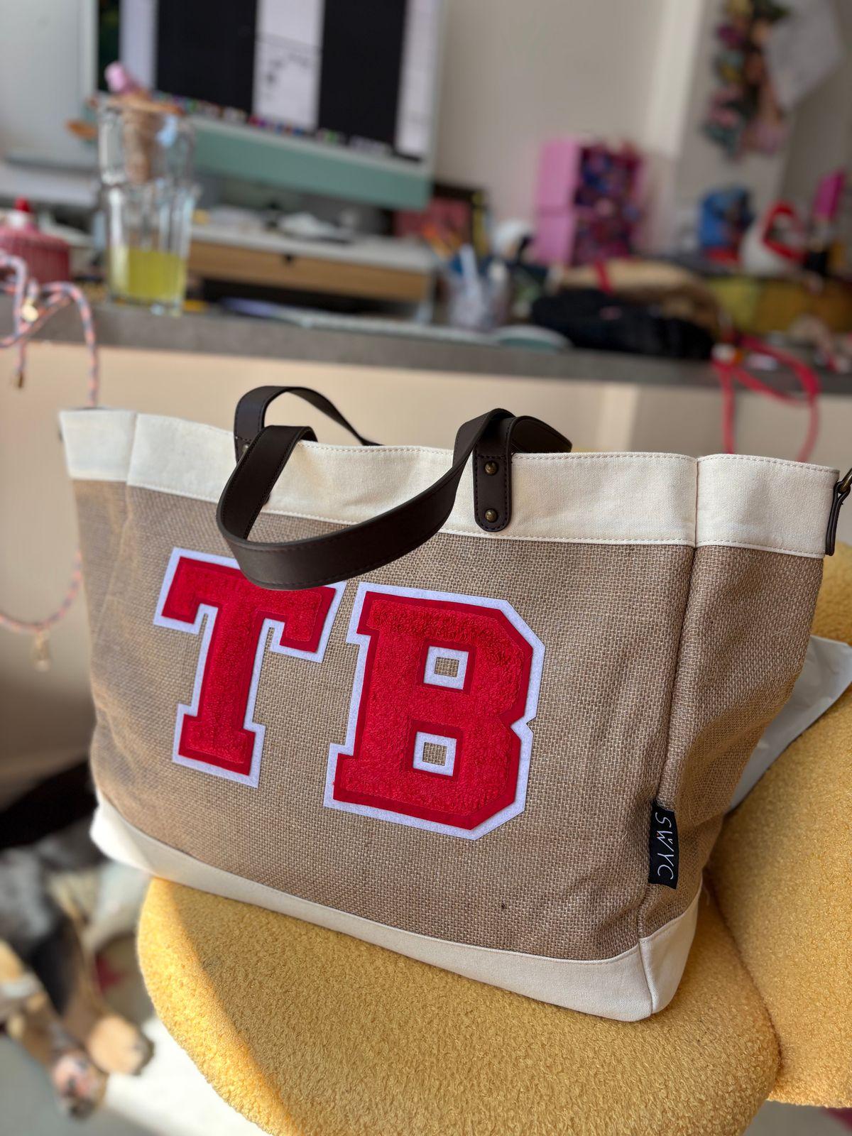 a bag with the number 18 on it sitting on a chair