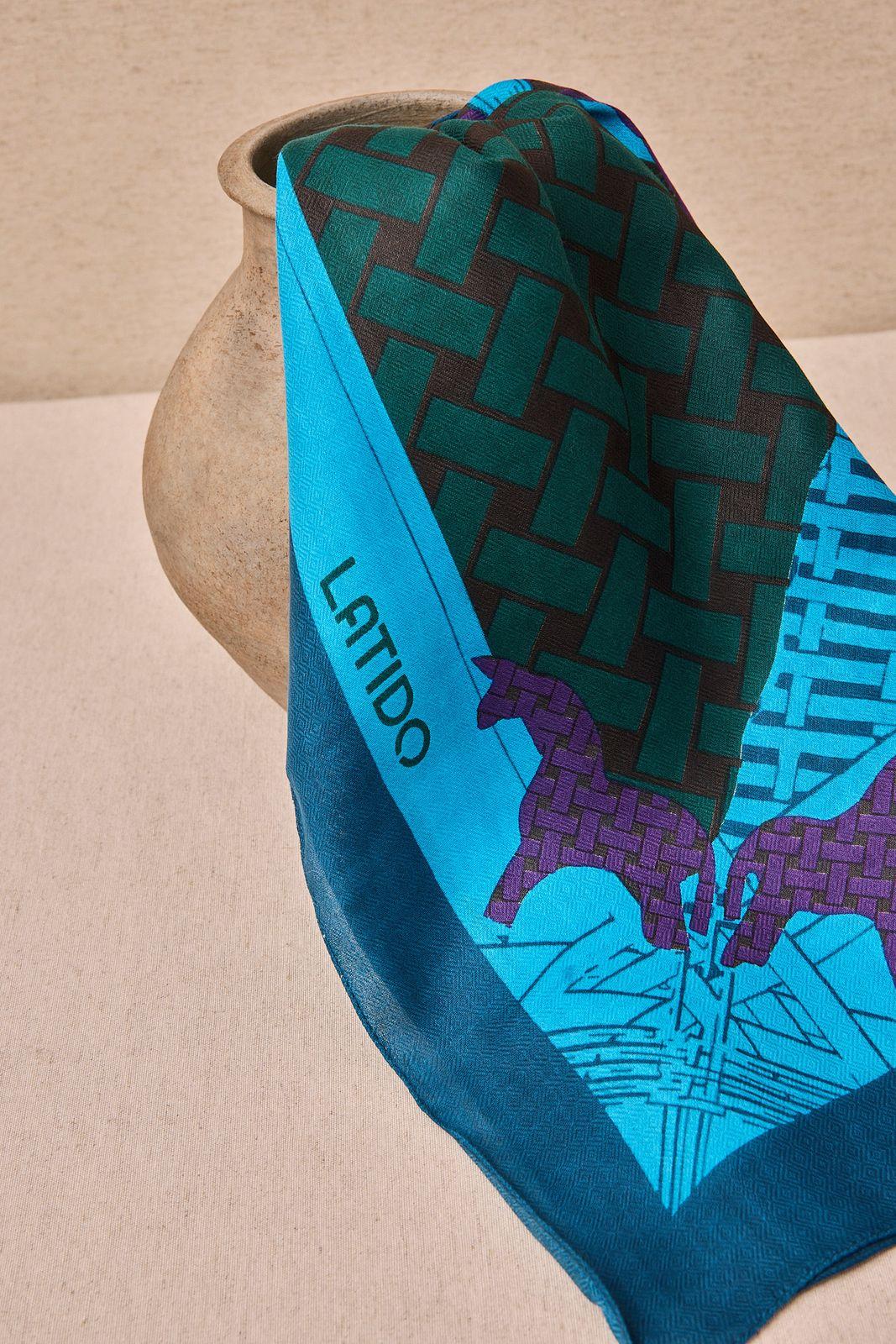 a neck tie with a horse on it