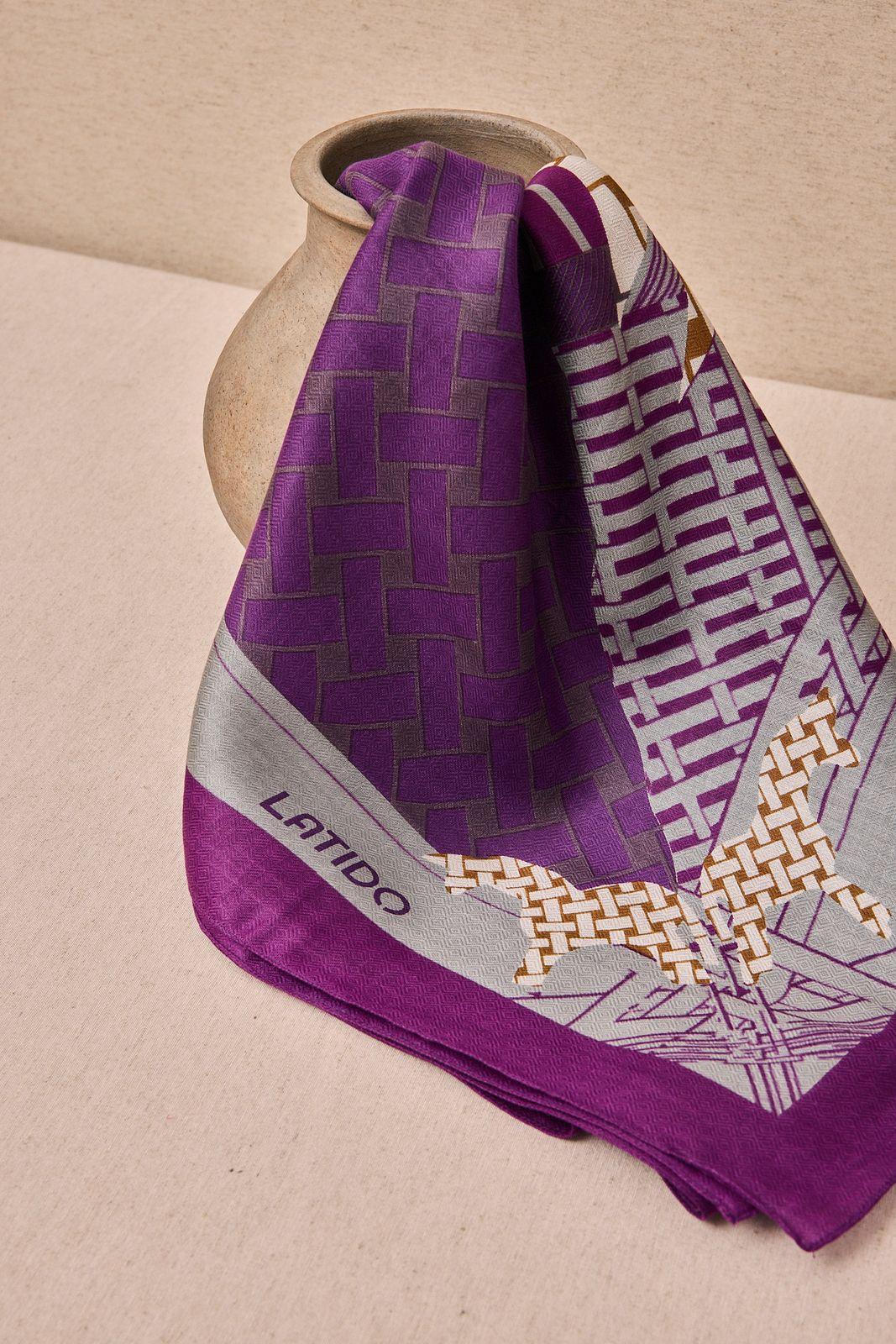 a close up of a tie on a table